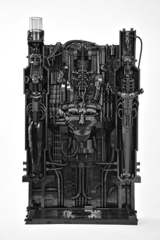 Illustration for article titled The artwork of H.R. Giger, recreated in LEGO bricks